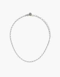 Sleek silver chain necklace with delicate oval links, perfect for layering or wearing alone. Versatile accessory for creating a personalized look with optional charms. Icon Chain Necklace | B by CLED