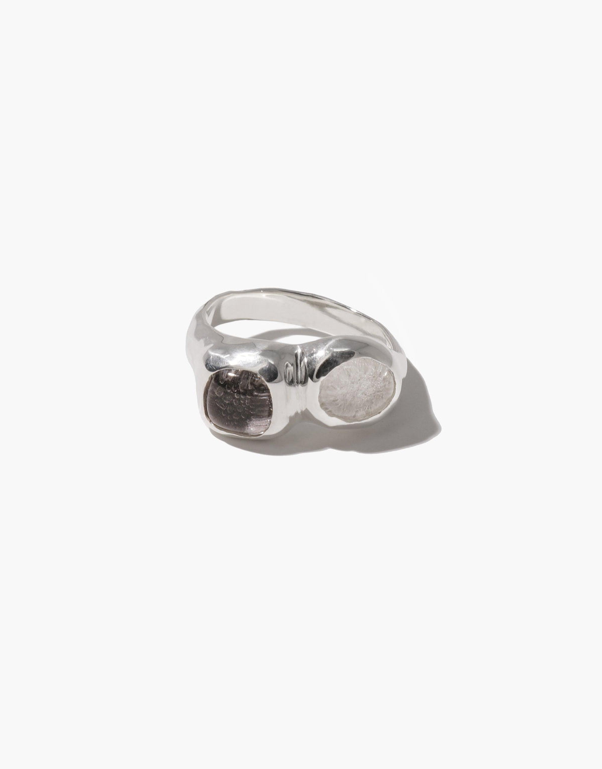 Duo Sculpture Ring featuring two upcycled eco gems in contrasting colors set in a sleek silver band, showcasing handcrafted artistry and sustainable design. Elegant and eco-friendly jewelry piece by CLED.