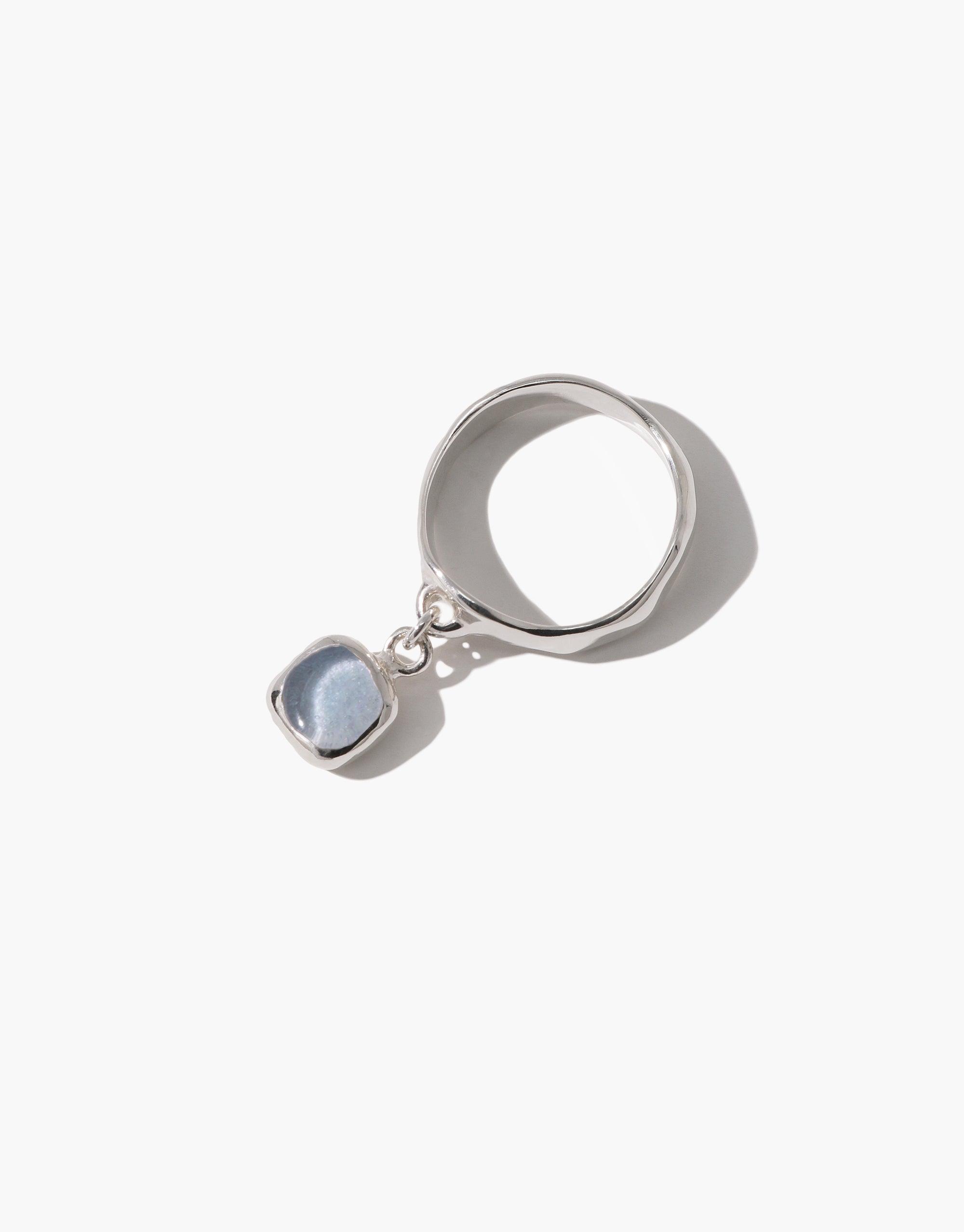 Square Dangling Ring featuring a blue Eco Gem stone, set in a silver band with a delicate chain link, crafted from repurposed glass, embodying eco-conscious elegance by CLED.