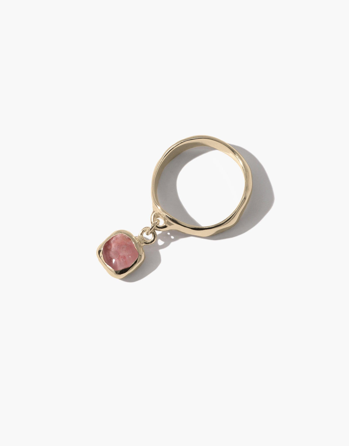 Square Dangling Ring featuring a pink Eco Gem, crafted from upcycled glass, set in a gold band. Handmade in Los Angeles with an eco-conscious design ethos.