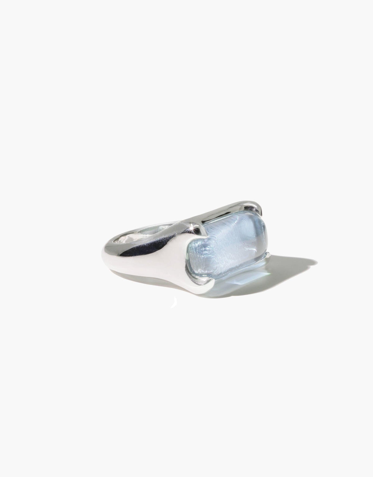 Elegant Prism Ring in Gold Plated finish featuring a rectangular eco gem made from upcycled glass. The transparent gem catches light, creating a prismatic effect. Sleek, modern design perfect for everyday wear. Handcrafted sustainable jewelry by CLED. Prism Ring | Gold Plated.