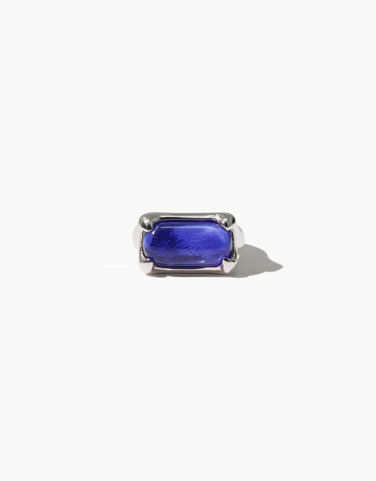 Gold plated Prism Ring featuring a vibrant blue eco gem made from upcycled glass. Rectangular stone set in a sleek, modern band, capturing light like a prism. Handcrafted sustainable jewelry piece showcasing CLED's commitment to eco-friendly design. Prism Ring | Gold Plated by CLED.
