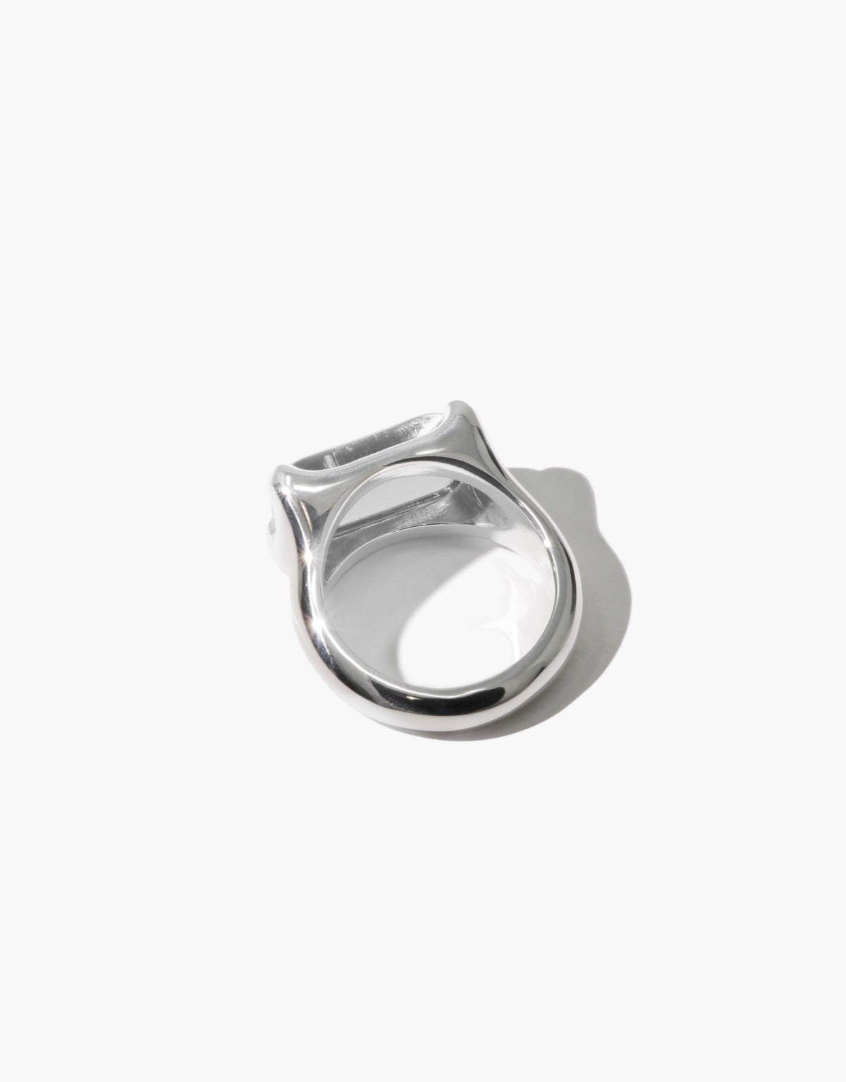 Sterling silver Prism Ring with unique prism-shaped design, showcasing a sleek and modern aesthetic. The ring's geometric form captures light, creating a captivating visual effect. Handcrafted with eco-friendly materials, this CLED Prism Ring | Sterling Silver combines style and sustainability.