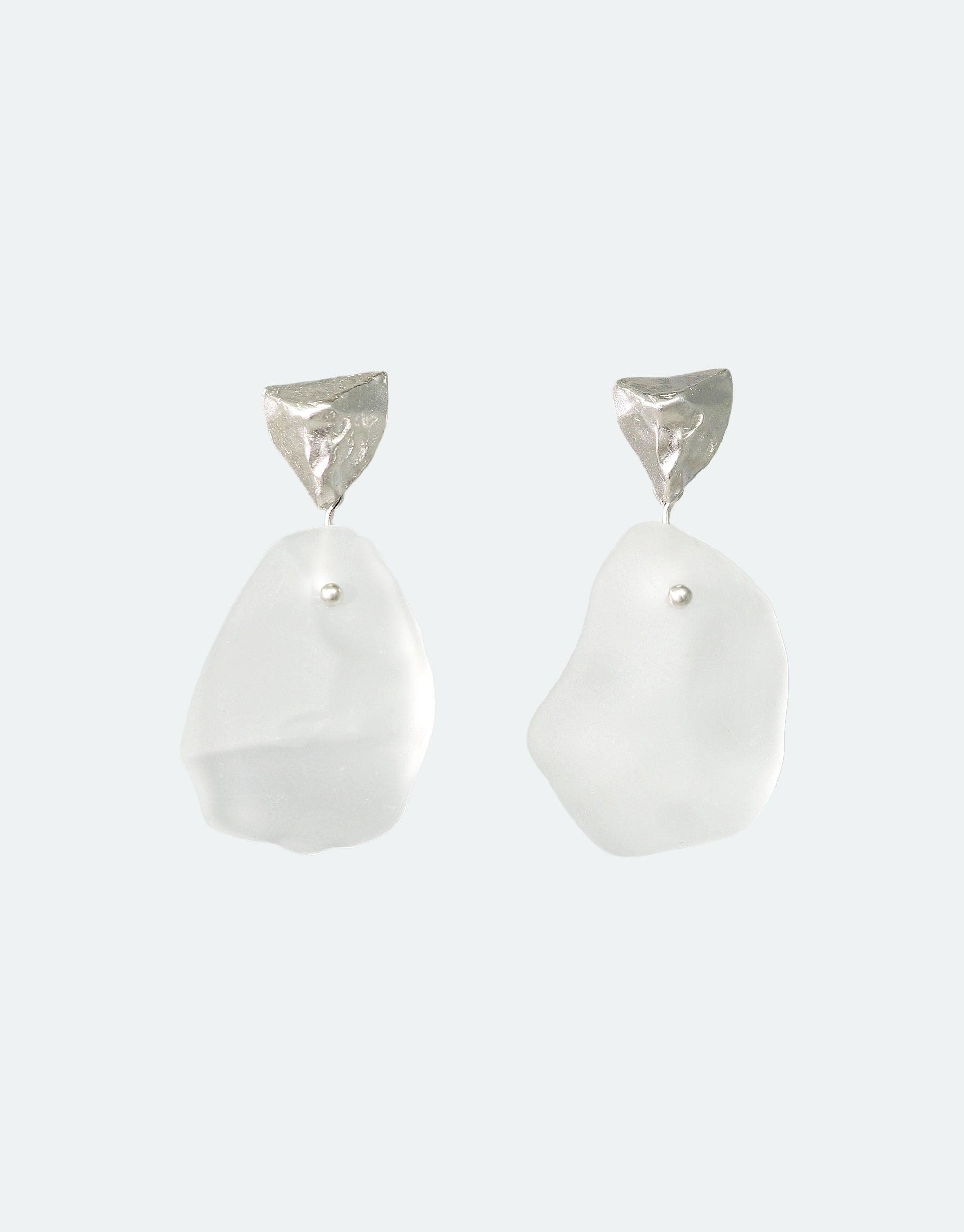 Tip of the Iceberg Earrings, featuring hand-formed Eco Gems from repurposed glass and matte silver triangles, inspired by melting icebergs. Sold as a pair, 2.4 inches long.