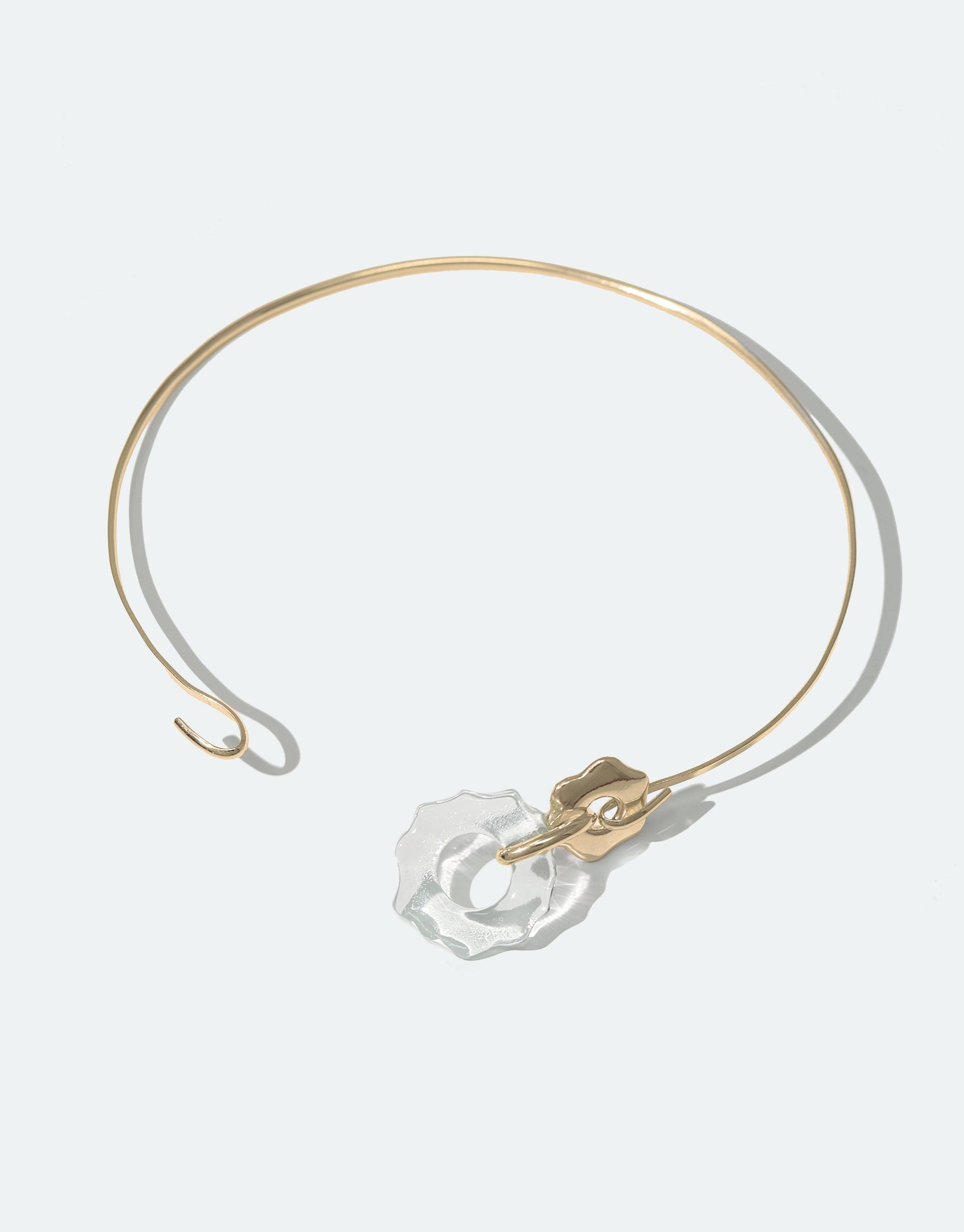 Elegant gold choker necklace with delicate clear glass pendant, inspired by Arctic avens flower. Minimalist design perfect for day to evening wear. Eco-friendly jewelry made from repurposed glass. Avens Choker Necklace by CLED.