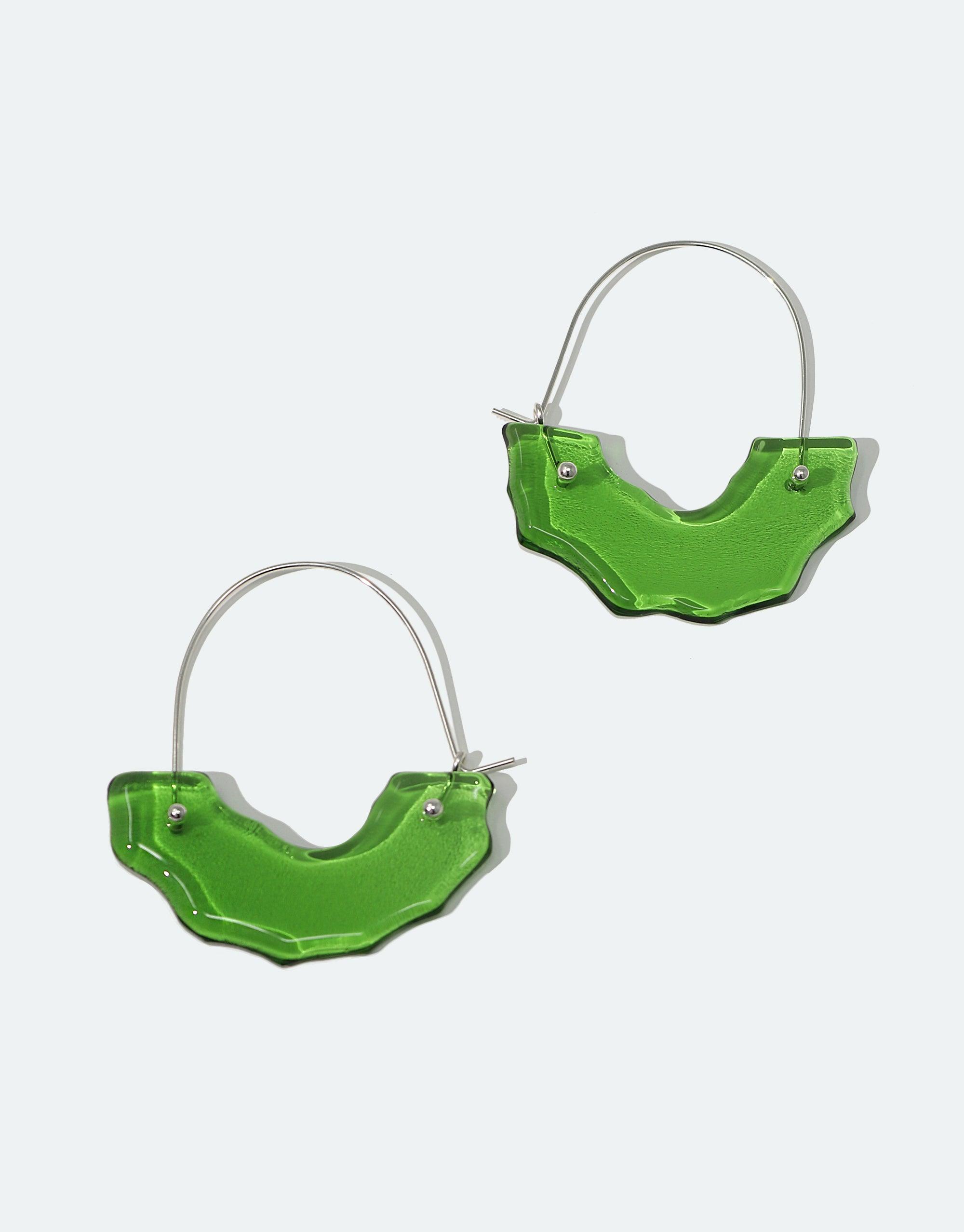 Polar Arch Hoop Earrings featuring bright green eco-friendly glass elements in abstract arch shapes, inspired by icebergs, suspended from silver hoops. Handmade sustainable jewelry raising awareness for Arctic ecosystems. CLED