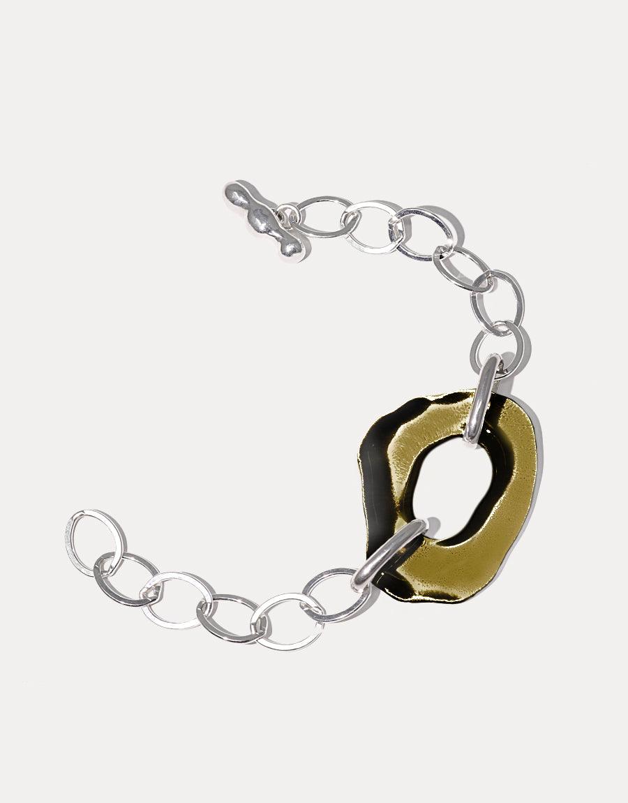 Sterling silver oval chain bracelet with organic free-form eco gem pendant in olive green, handcrafted from repurposed glass bottles. High Tide Oval Chain Bracelet features a unique sustainable design, perfect for eco-conscious fashion lovers. CLED