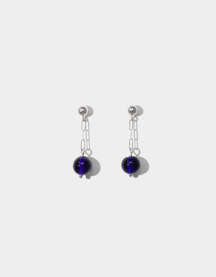 Elegant Small Drop Earrings featuring delicate chain links and vibrant blue glass beads. Sterling silver construction with a minimalist design. Handcrafted earrings perfect for everyday wear. Sustainable jewelry made from repurposed glass. CLED