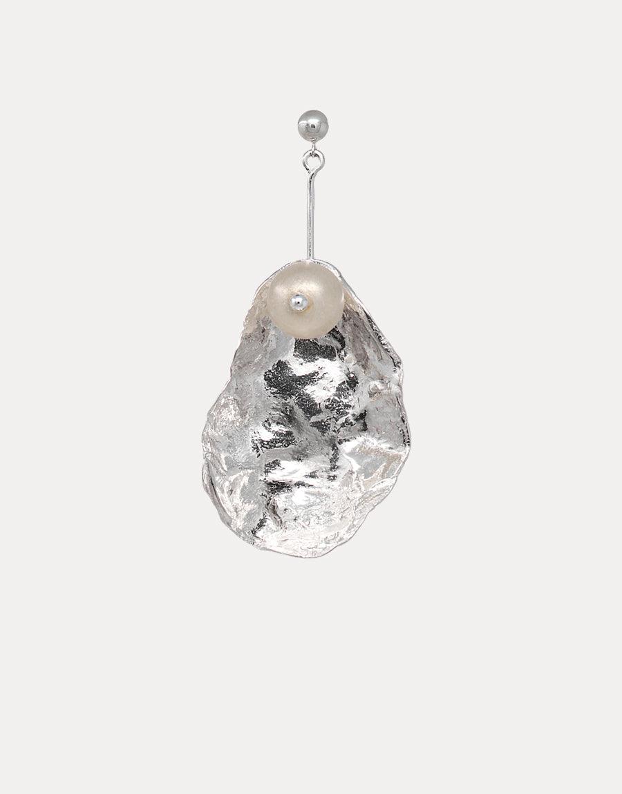 Sterling silver dangle earring with textured metal shell and sustainable eco gem pearl made from recycled glass. Elegant and eco-friendly design showcasing unique texture and light-catching properties. Not A Pearl Earring by CLED.