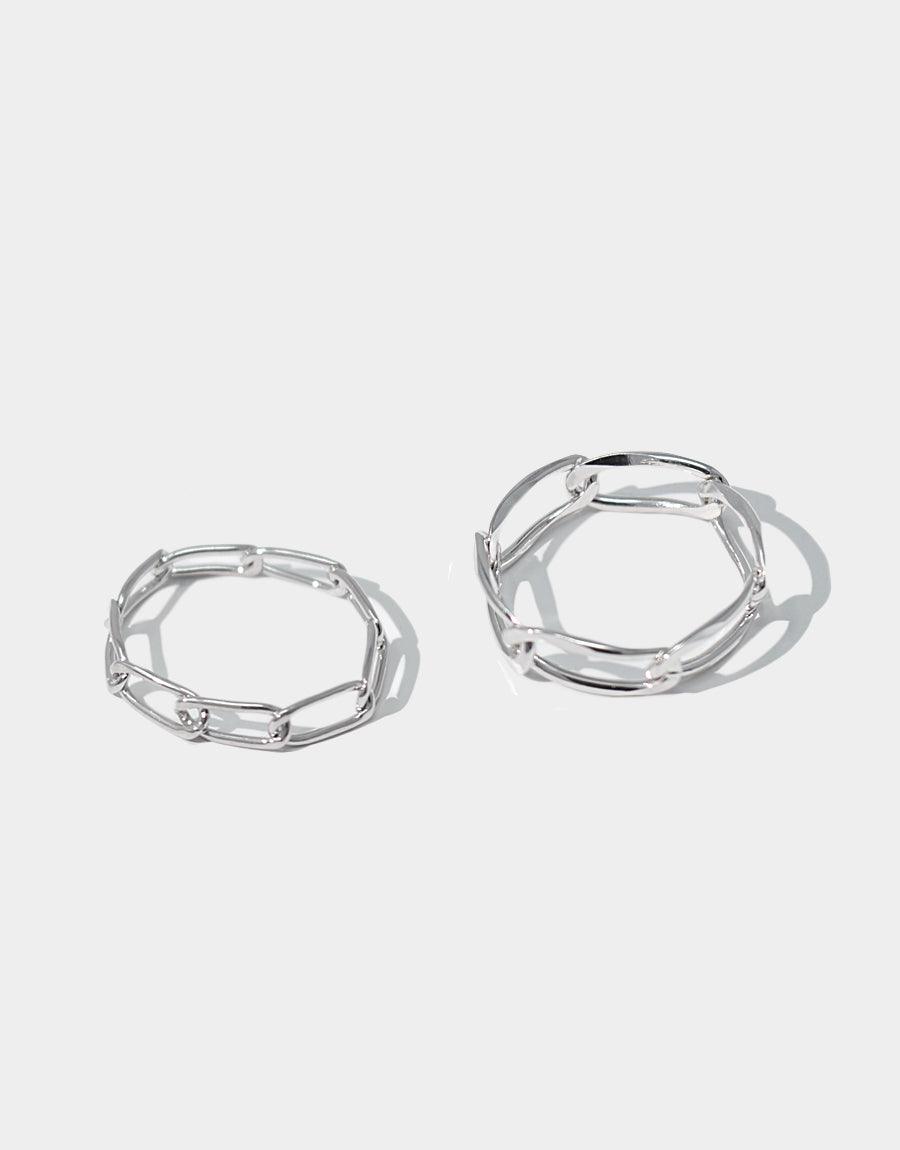 Sterling silver Collapsible Chain Ring D, featuring flexible linked design. Two sizes shown, small and large. Handcrafted in Los Angeles. Versatile and stackable jewelry piece. Collapsible Chain Ring | D by CLED