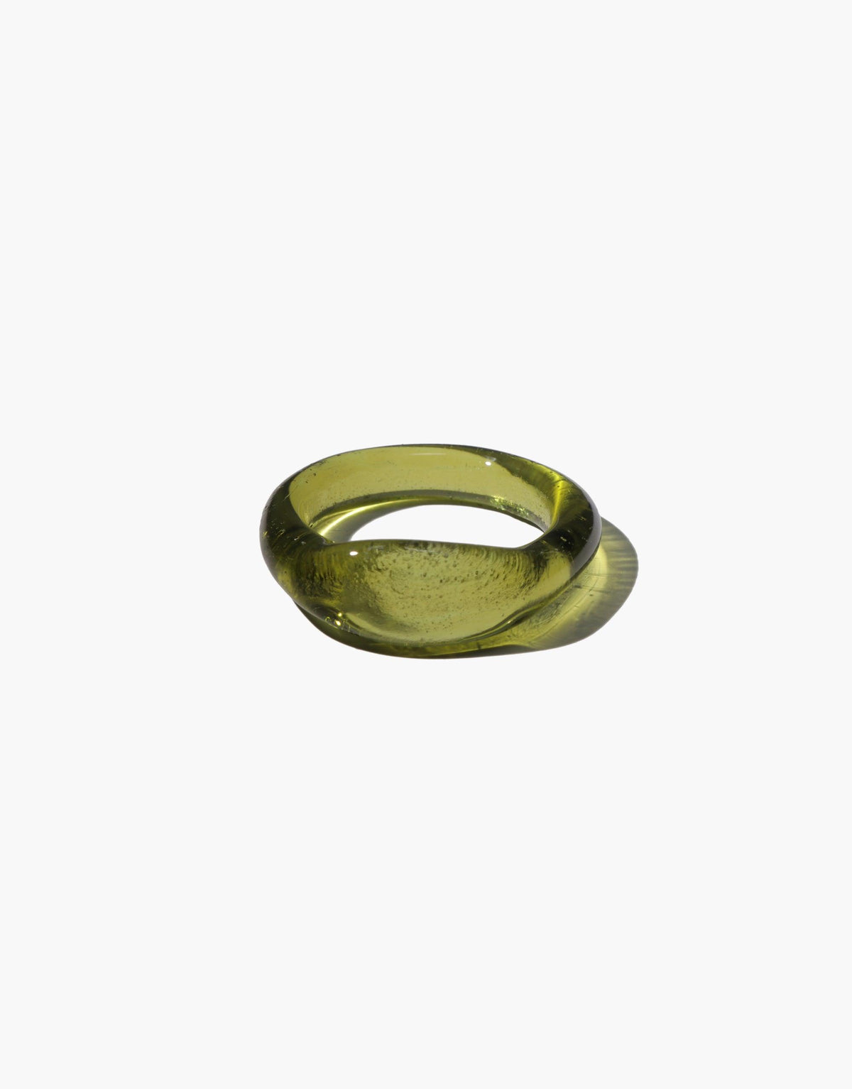 Signet Ring Original in translucent olive green eco-friendly glass, handcrafted with smooth rounded edges. Sustainable jewelry piece from the Messenger Collection, showcasing CLED's commitment to repurposing discarded materials. CLED